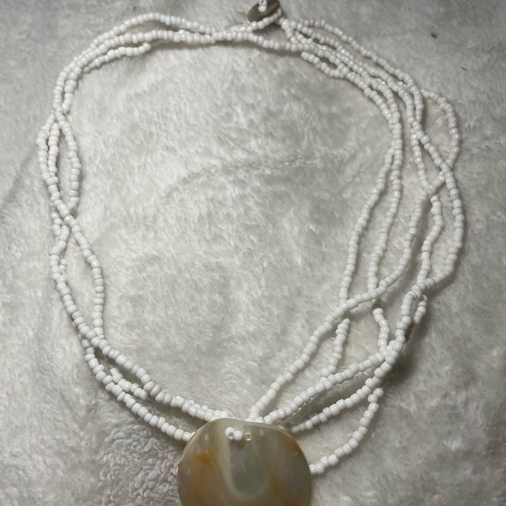 White Beaded Multi-Strand Necklace with Natural Shell Pendant